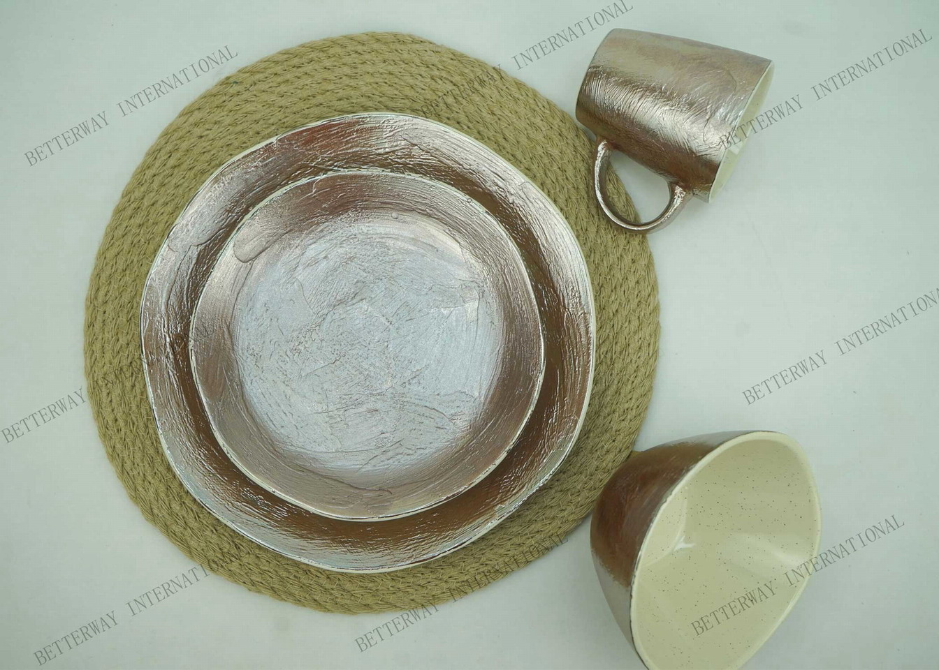 Stoneware dinnerware with metallic glaze & speckle