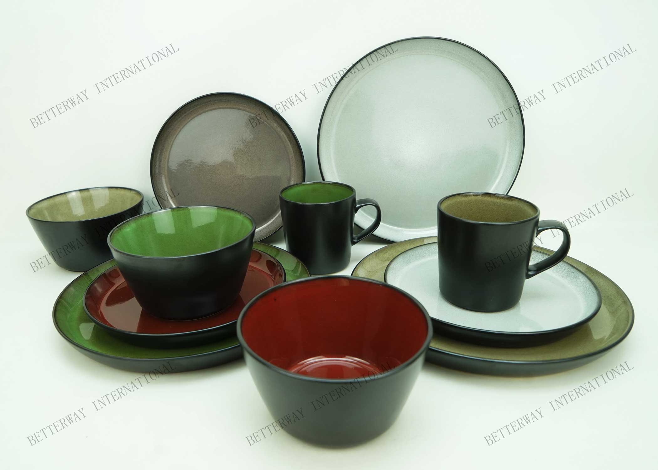 Stoneware dinnerware inside with reactive glaze outside matte black