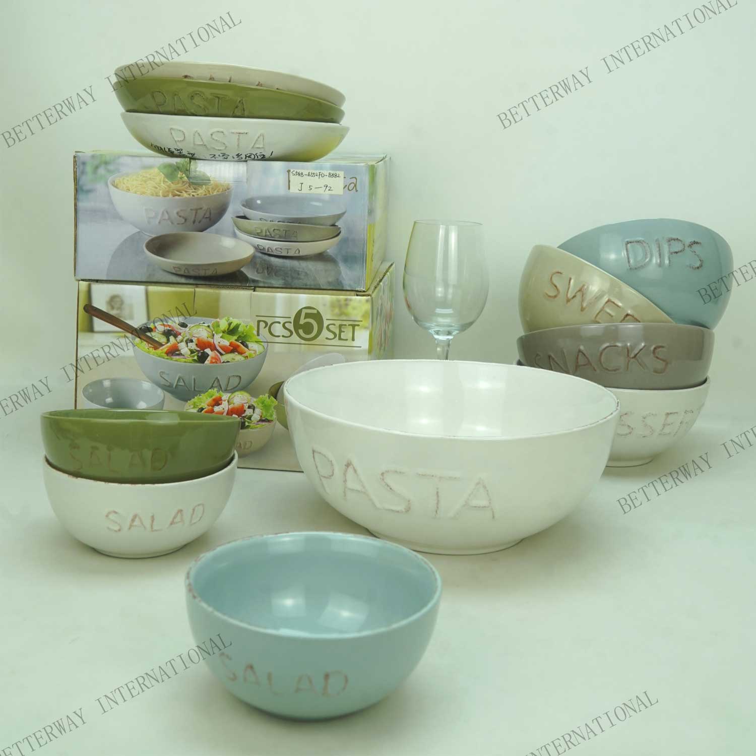 Stoneware pasta/salad bowl set with embossed word with brushed color