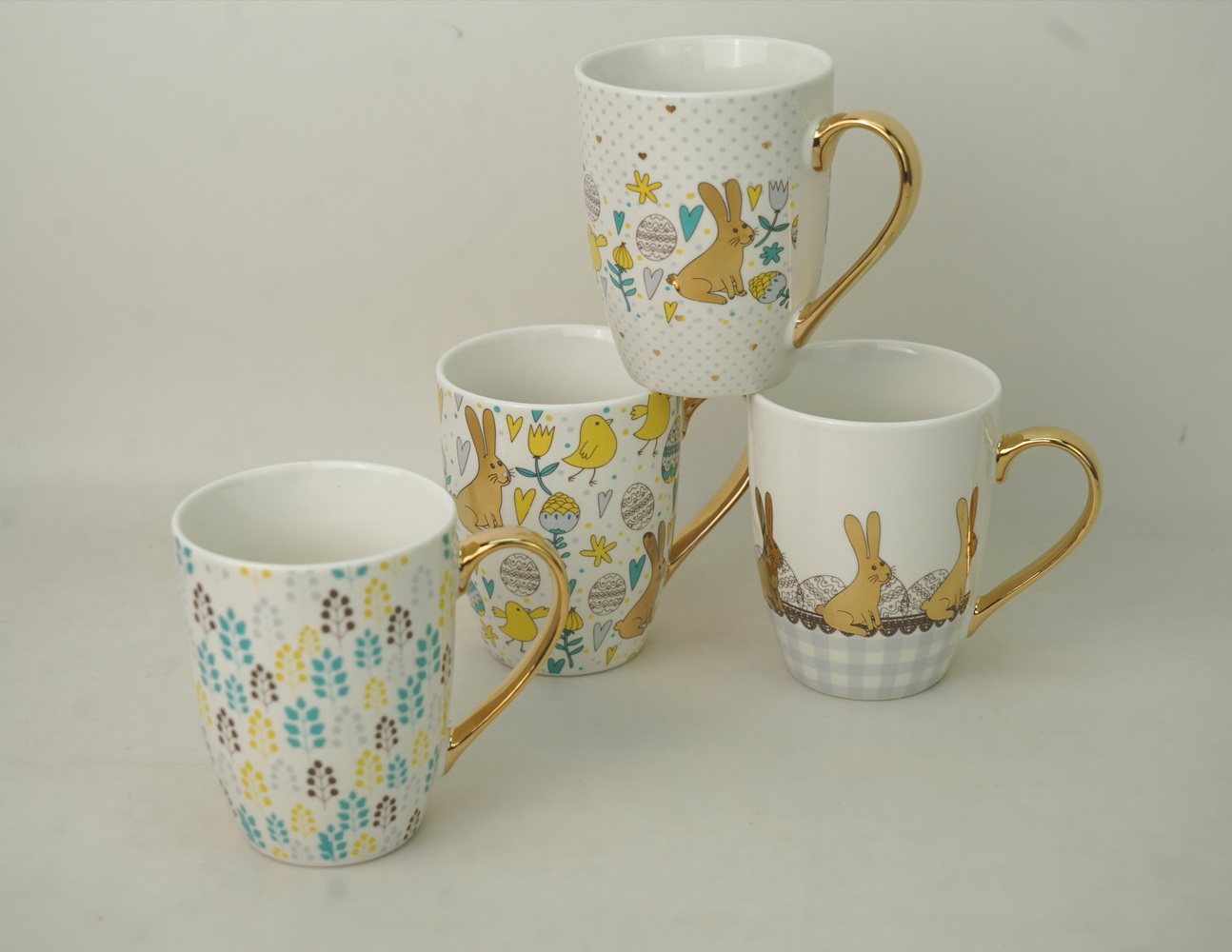new bore china coffee mug with gold design