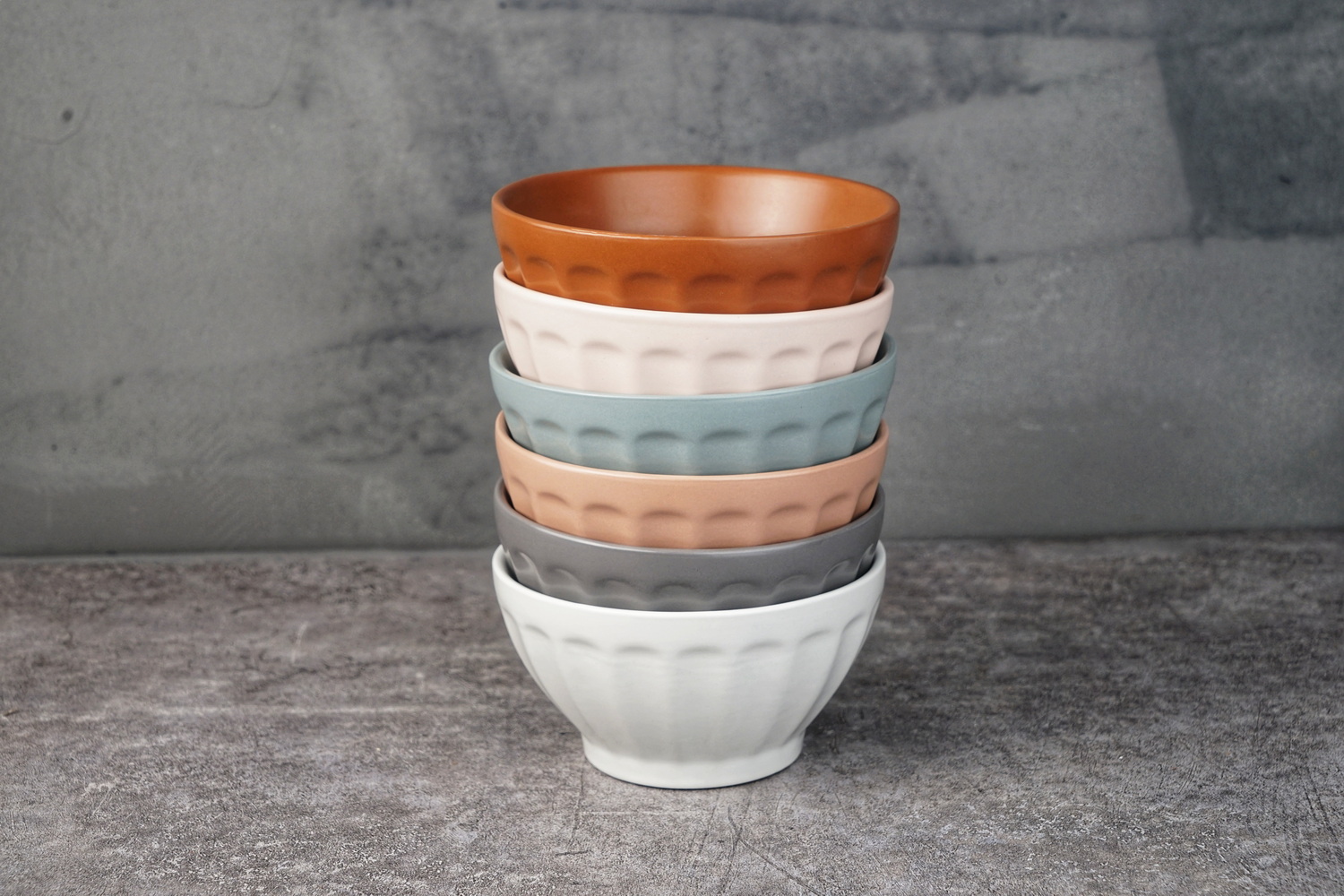 stoneware bowl solid color glaze embossed with lines