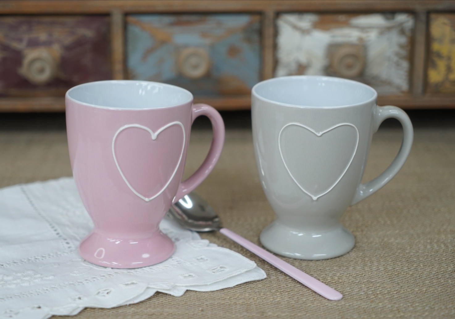 stoneware footed mug with heart pattern