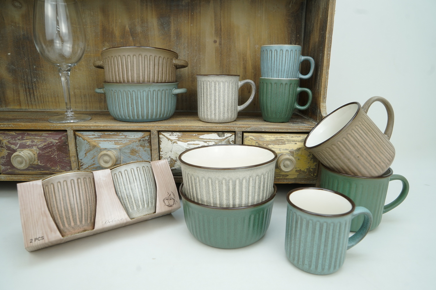 stoneware mug bowl reactive glaze embossed lines