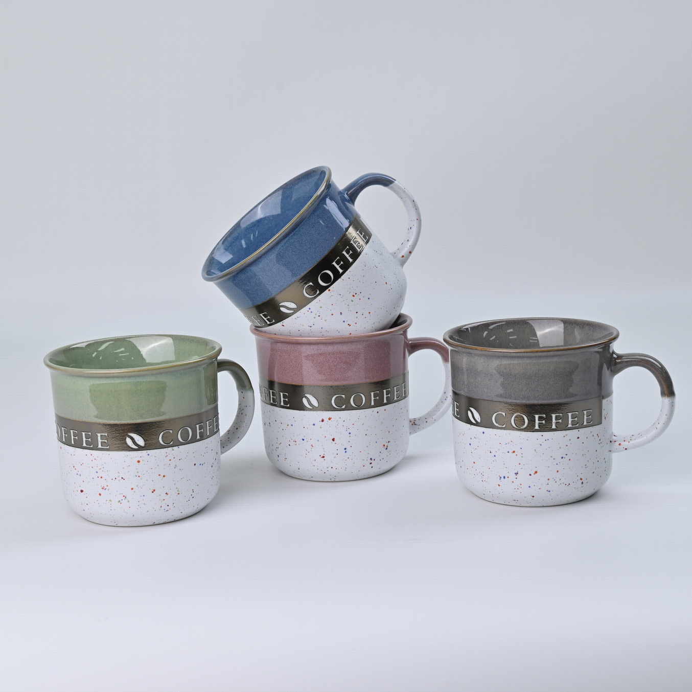 stoneware mug reactive glaze with metallic pattern embossed words BH651