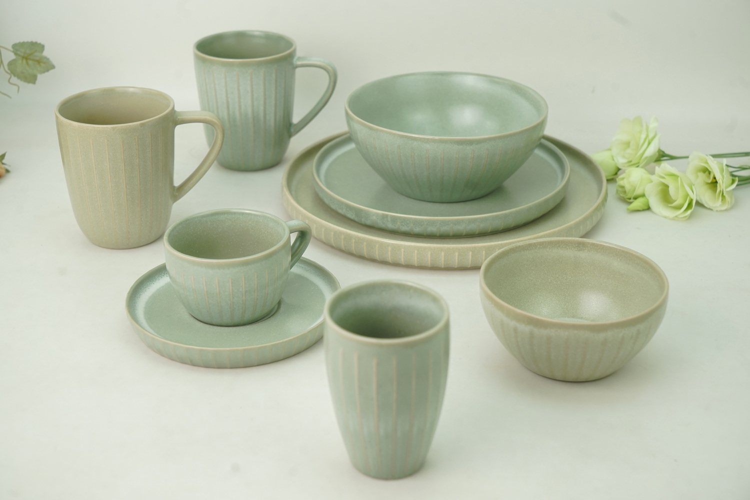 Stoneware dinnerware outside embossed rib with reactive glaze