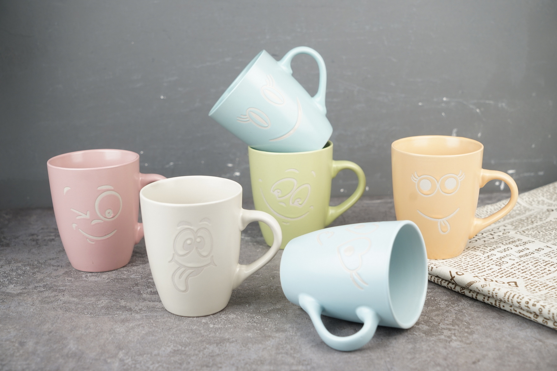 stoneware bullet mug embossed smile face LS120
