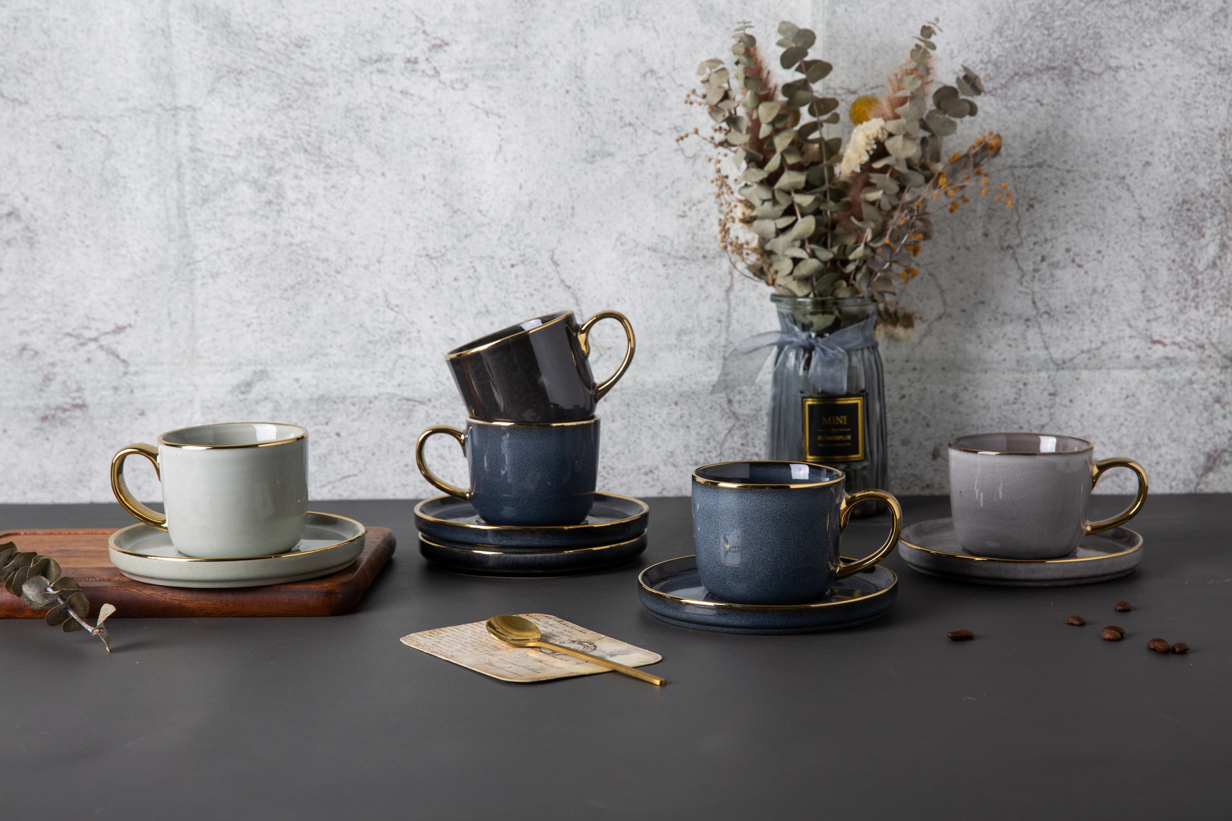 stoneware coffee cup and saucer reactive glaze with gold rim YX